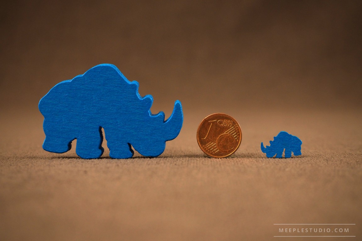 custom meeple showing the scale small and big pawn on a coin background